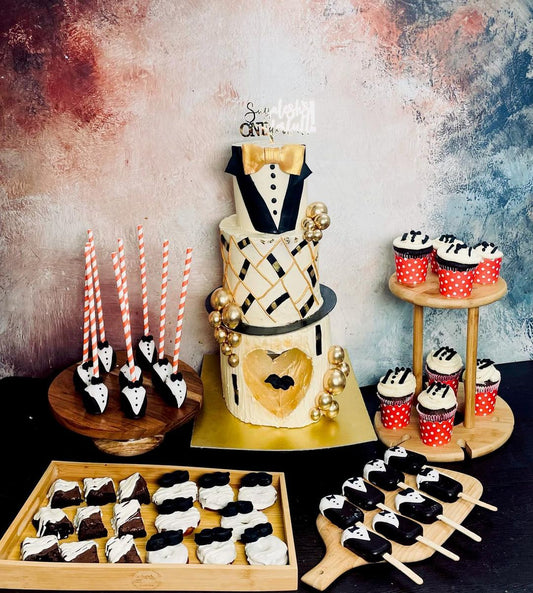 Suit Theme Cake with Dessert Spread