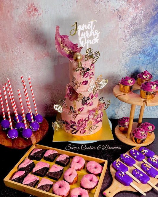 Floral Butterfly Designer Cake with Dessert Spread