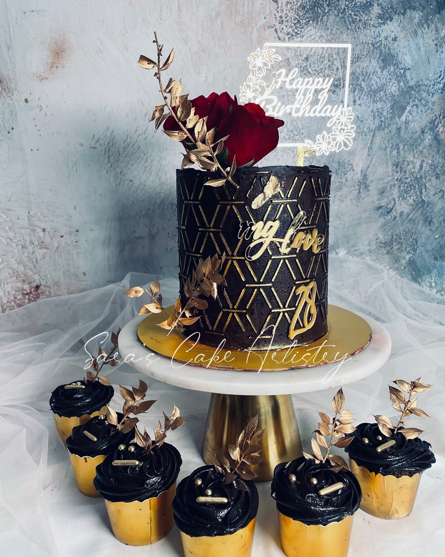 Black and Gold Party Theme Cake with Dessert Spread